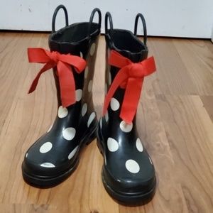 Polka dot rubber boots with red bow